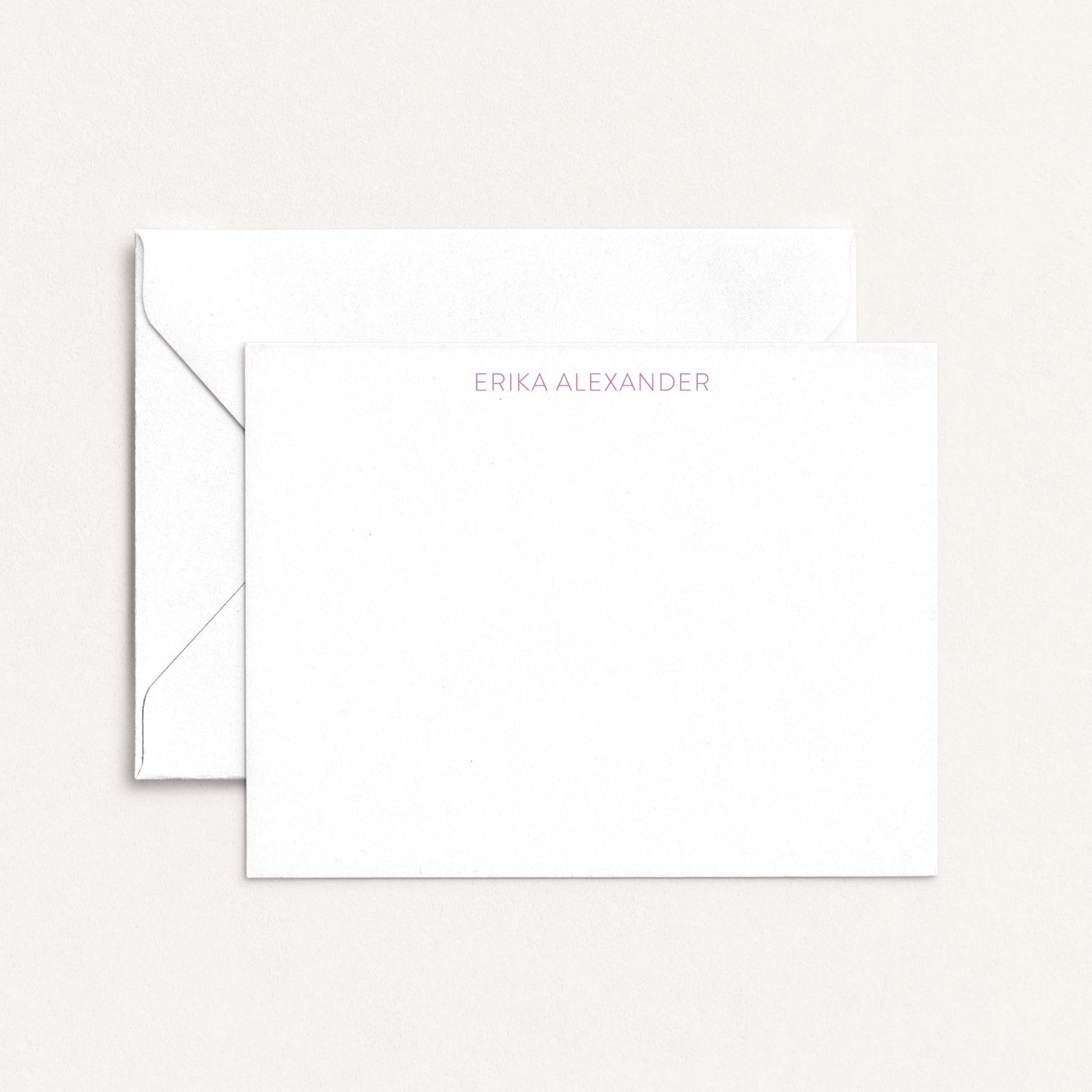 Personalized notecard with the name Erika Alexander in soft lavender font, paired with a white envelope on a neutral background.