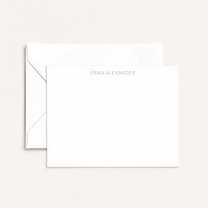 Personalized notecard with the name Erika Alexander in soft lavender font, paired with a white envelope on a neutral background.
