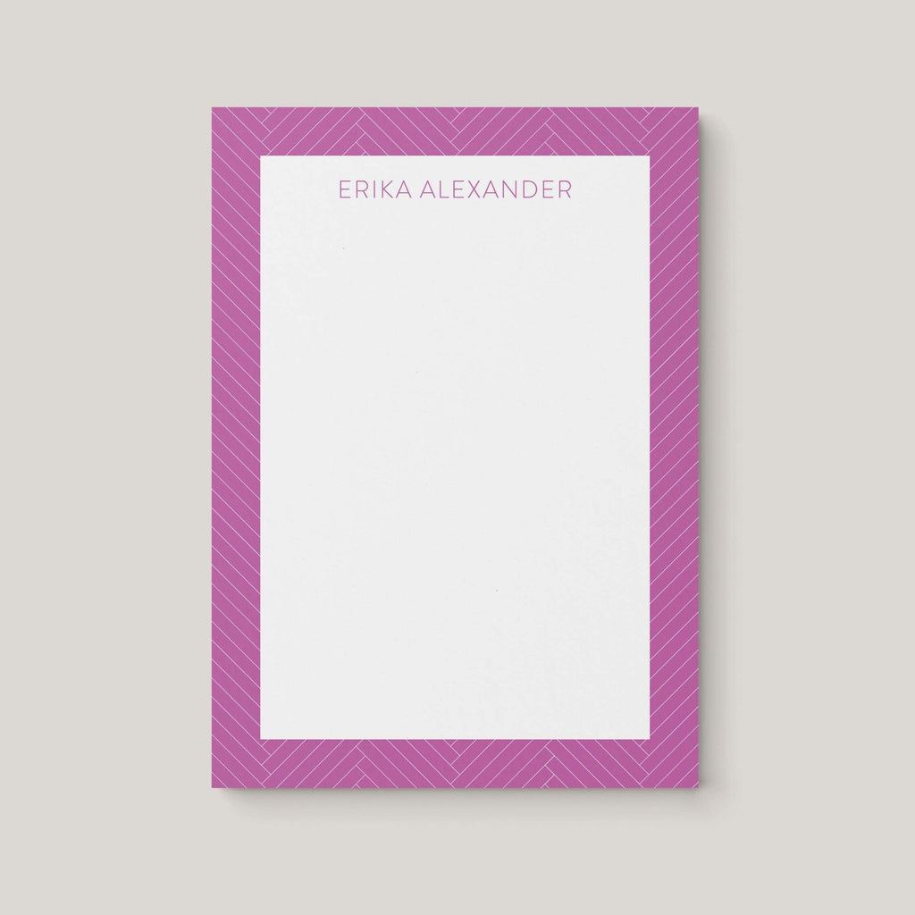 Erika Pattern personalized notepad by Blú Rose, white notepad with an orchid herringbone-patterned border and the name 'Erika Alexander'