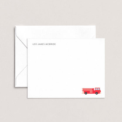A white envelope with a red fire truck illustration on the front.