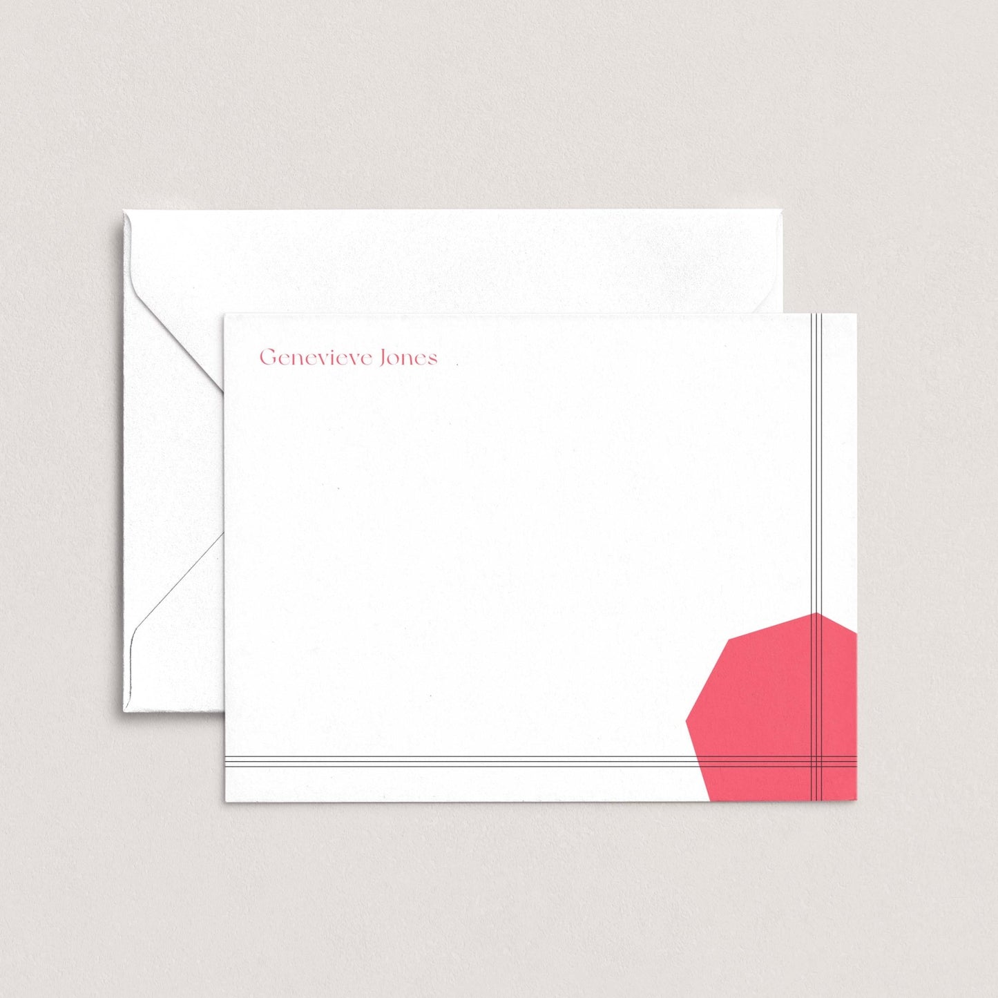 a white envelope with a red geometric design on the right side.