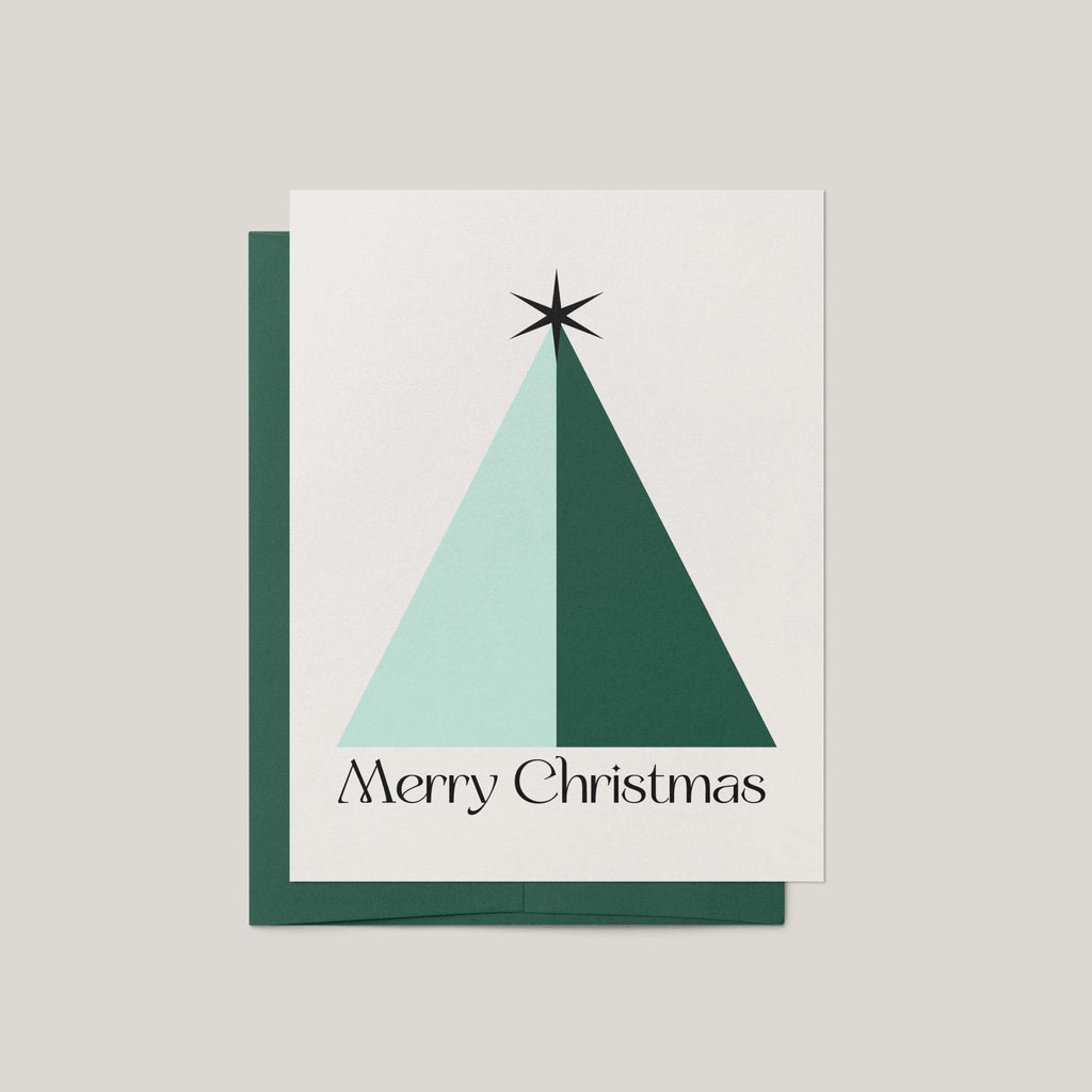 Geo Christmas Tree card by Blú Rose, ivory card with geometric mint and green triangle tree and Merry Christmas text, shown with green envelope