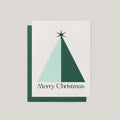 Geo Christmas Tree card by Blú Rose, ivory card with geometric mint and green triangle tree and Merry Christmas text, shown with green envelope
