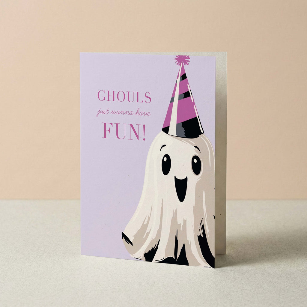 Ghouls Just Wanna Have Fun Halloween card by Blú Rose standing upright, lavender card with party-hat ghost on a neutral background