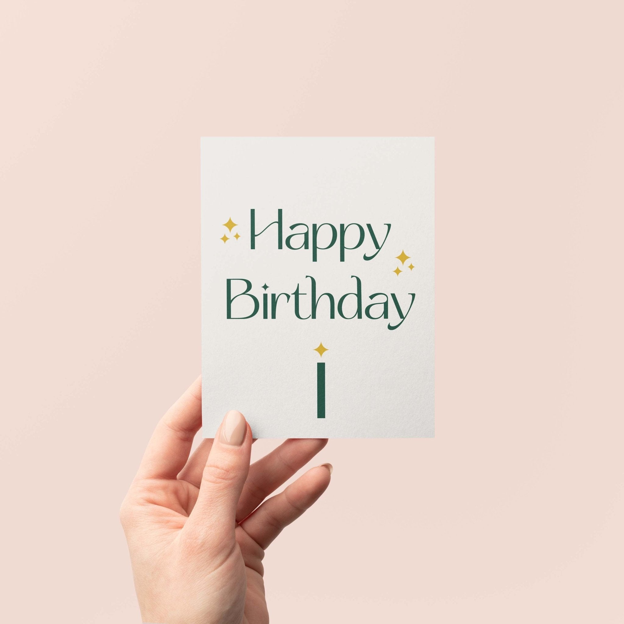 Green Sparkle Birthday greeting card by Blú Rose held in hand against a neutral off-white background