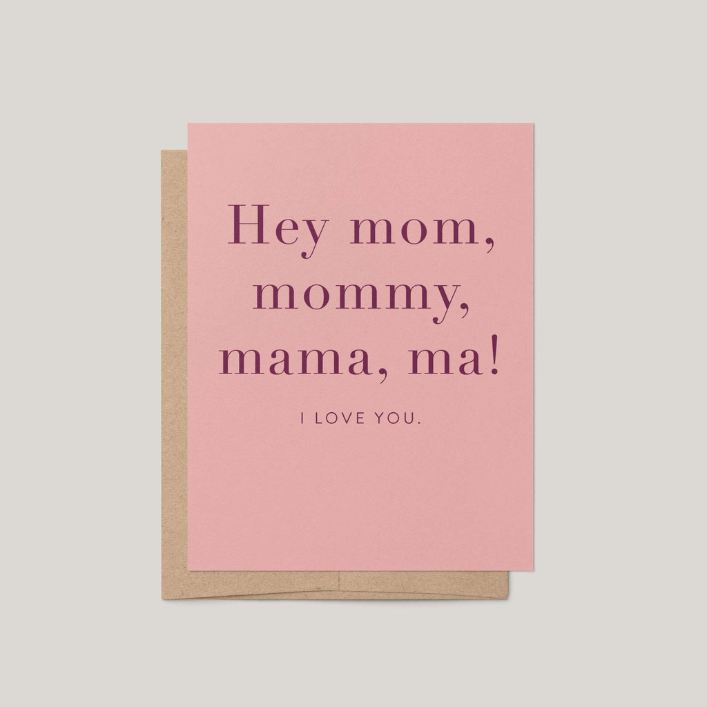 Hey Mom Mother's Day greeting card by Blú Rose, pink card with plum serif hey mom mommy mama ma I love you text, shown with kraft envelope