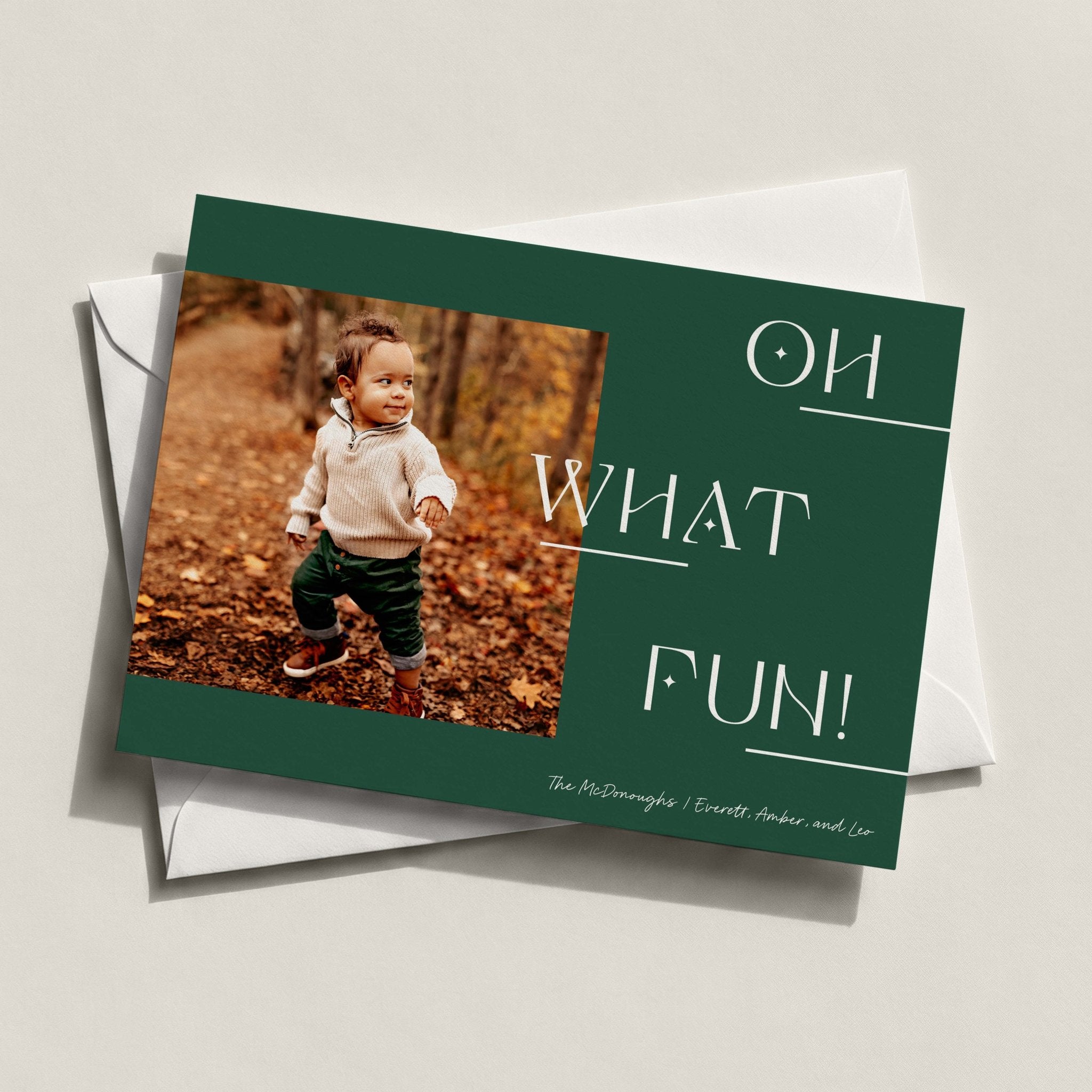 Left Photo landscape card in forest green with a child's photo and OH WHAT FUN in white
