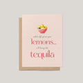 Lemons + Tequila funny friendship greeting card by Blú Rose, blush card with bowl of lemons illustration, shown with kraft envelope