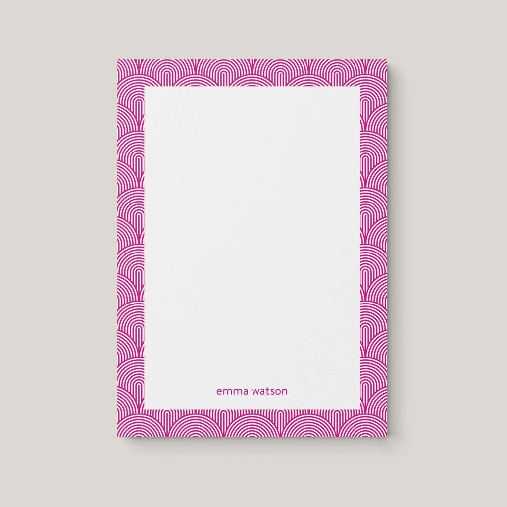 Lined Arches personalized notepad by Blú Rose, white notepad with a magenta art-deco arch border and the name 'Emma Watson'