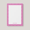 Lined Arches personalized notepad by Blú Rose, white notepad with a magenta art-deco arch border and the name 'Emma Watson'