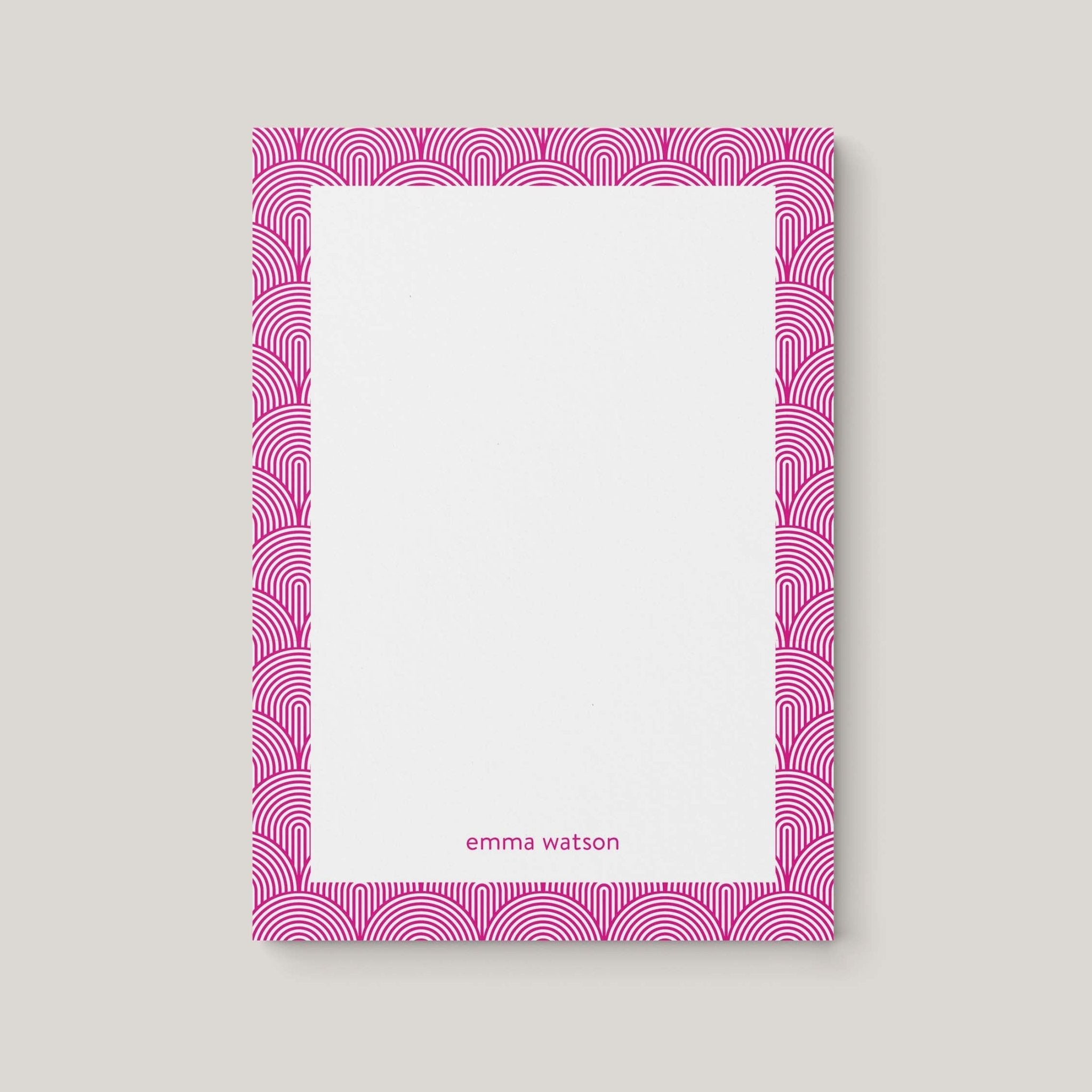 Lined Arches personalized notepad by Blú Rose, white notepad with a magenta art-deco arch border and the name 'Emma Watson'
