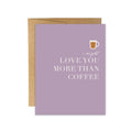 Love You More Than Coffee card by Blú Rose, lilac card with coffee cup illustration and white text, shown with kraft envelope