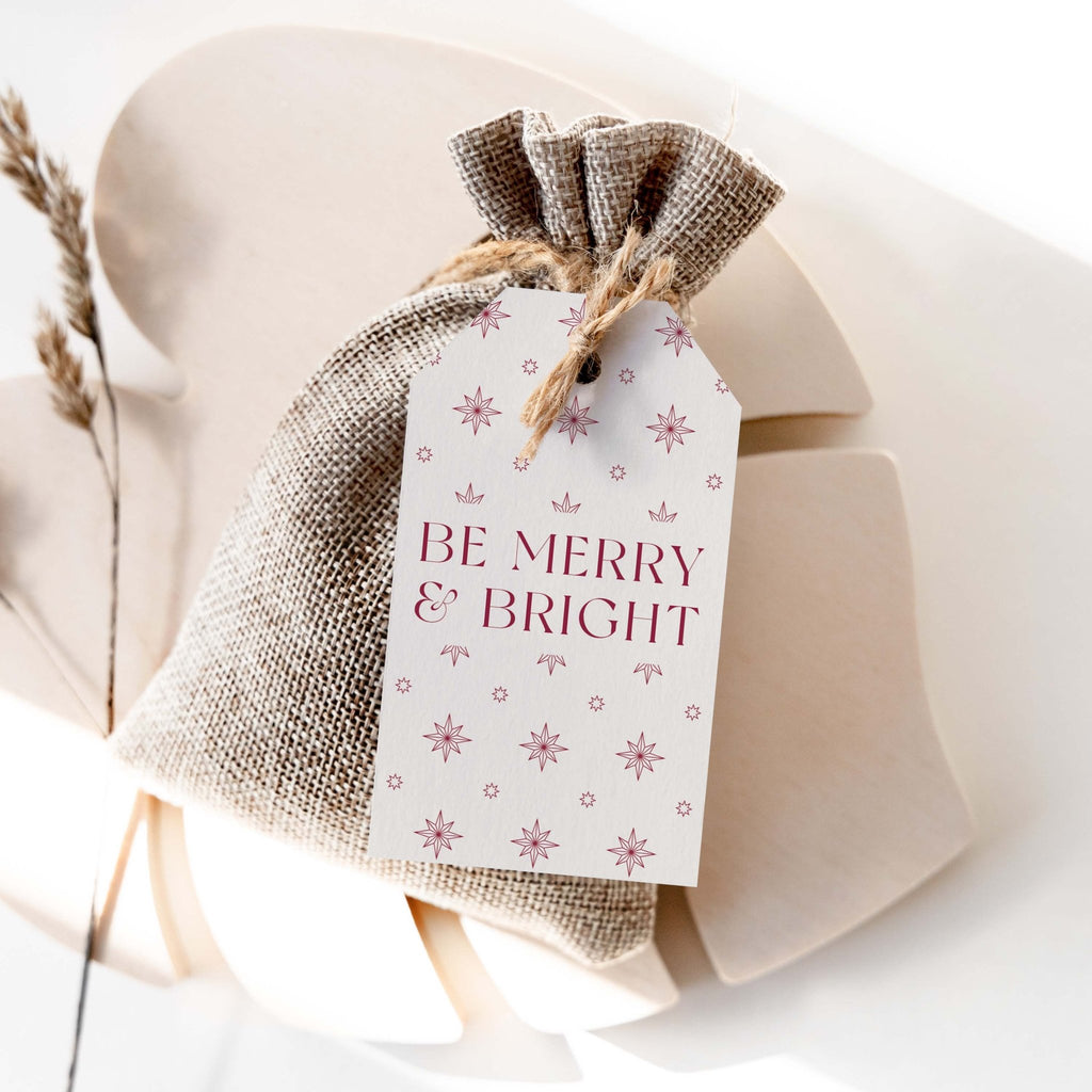 Merry & Bright gift tag by Blú Rose, cream 'Be Merry & Bright' tag with burgundy stars on a burlap favor bag