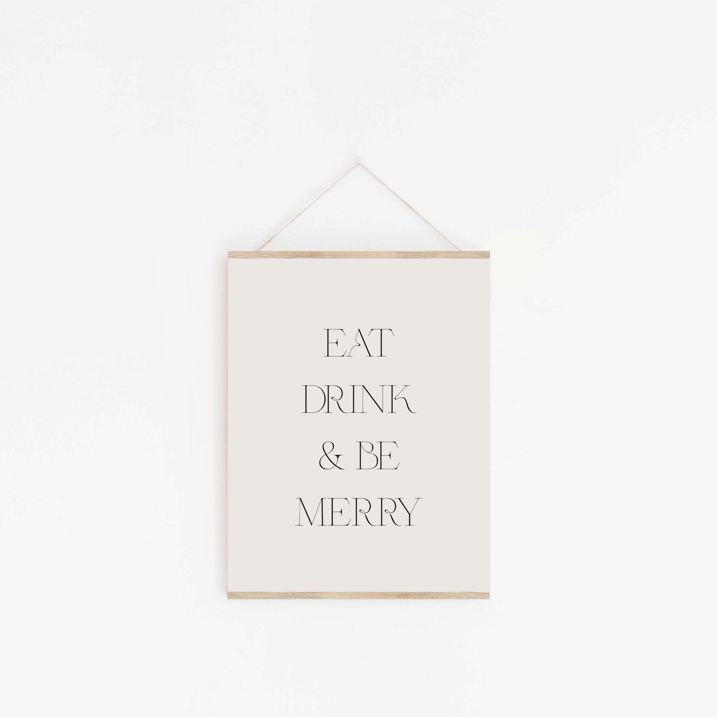 Minimal Eat Drink & Be Merry typography art print hanging on the wall