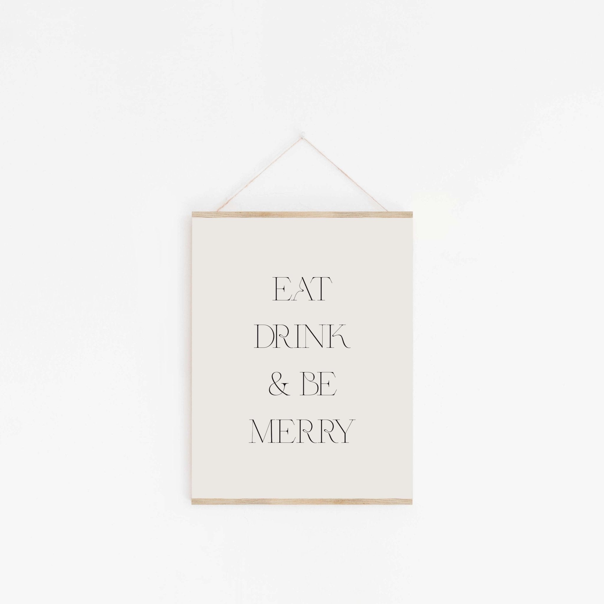 Minimal Eat Drink & Be Merry typography art print hanging on the wall