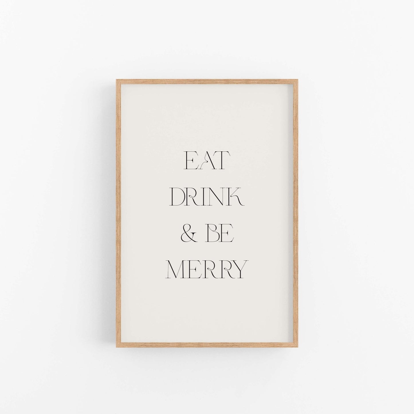 Eat Drink & Be Merry minimalist typography art print with light wood frame