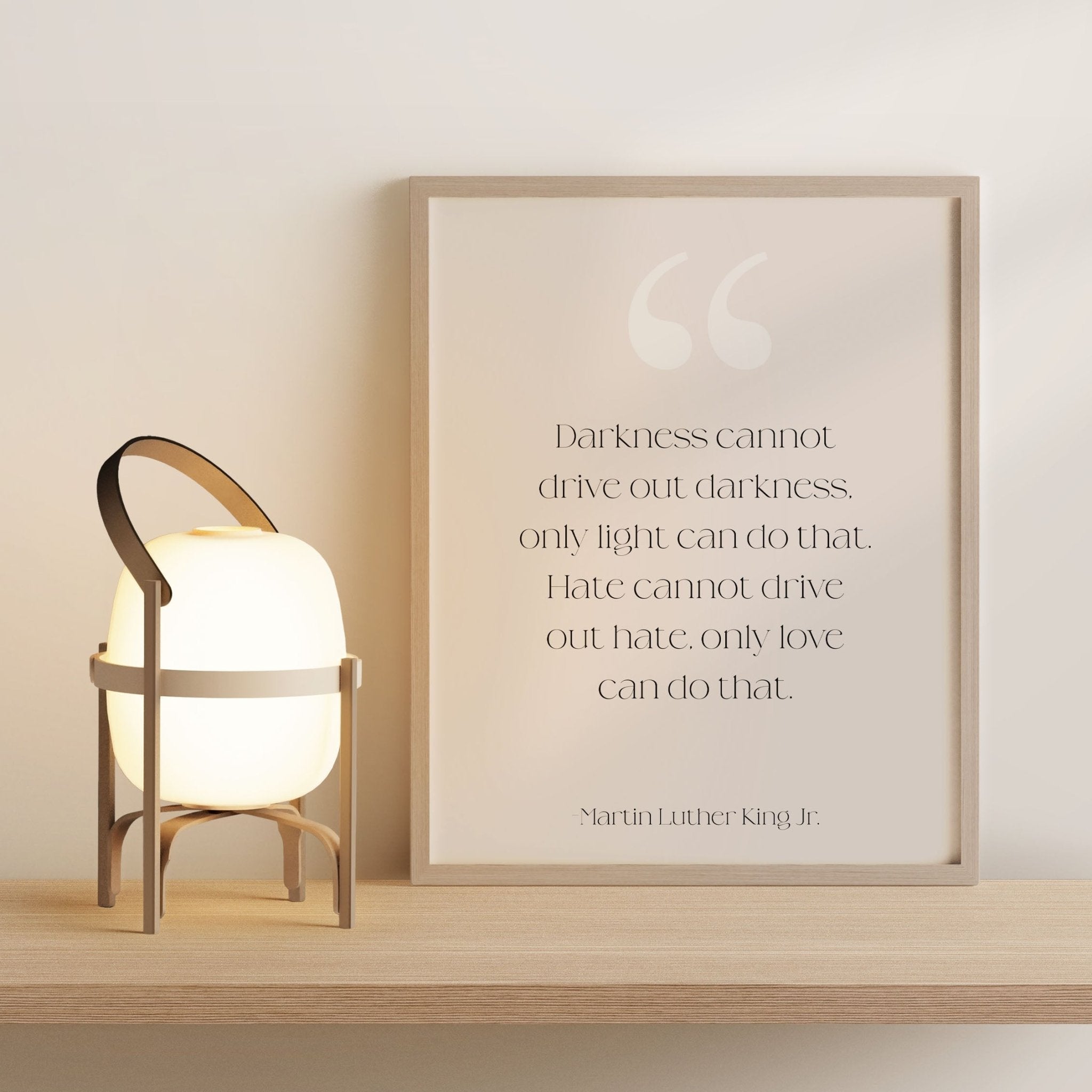 MLK quote wall art styled on shelf with modern neutral decor