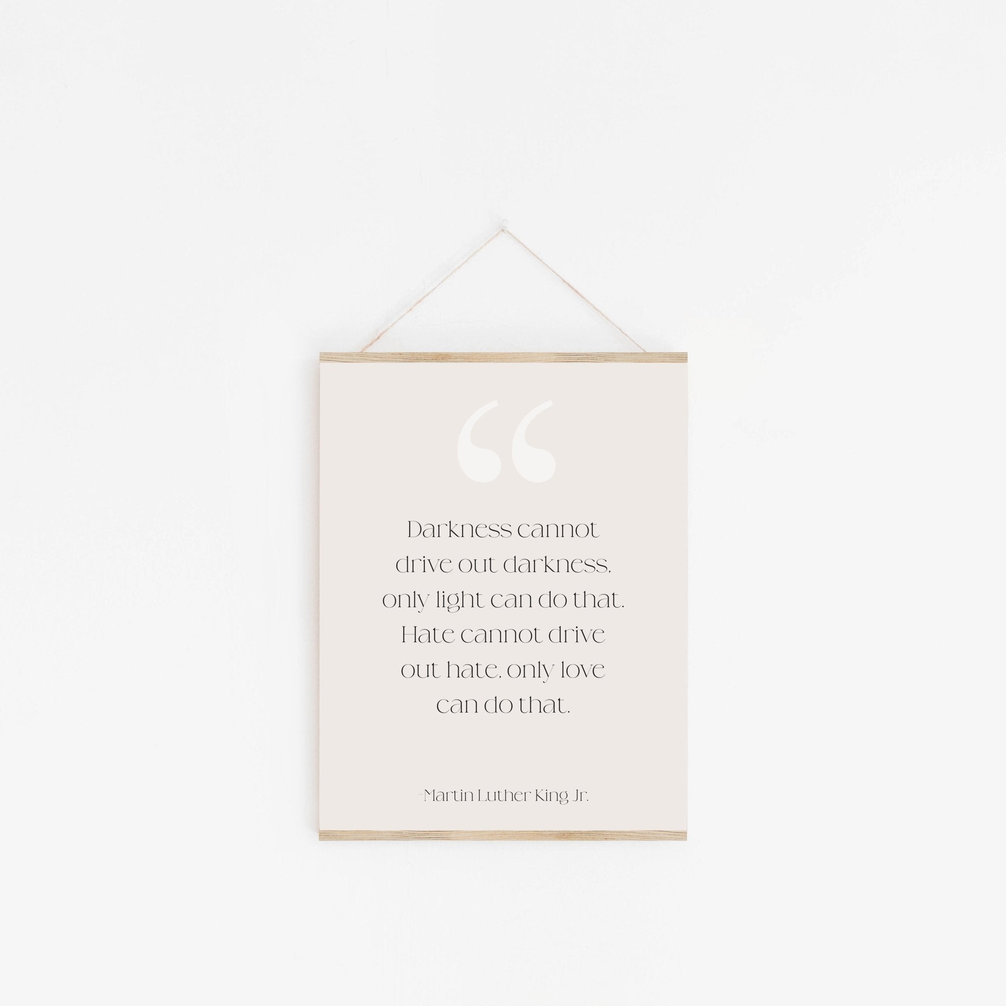 Inspirational MLK quote art print hanging on wall with minimalist design