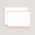 Mod Border personalized notecards by Blú Rose, white flat notecard with peach color-block borders and 'Love Quinn', shown with a coordinating white envelope
