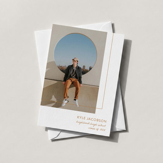 Mod Box graduation announcement card with photo, geometric border detail, and grad name, school, and class year printed below.