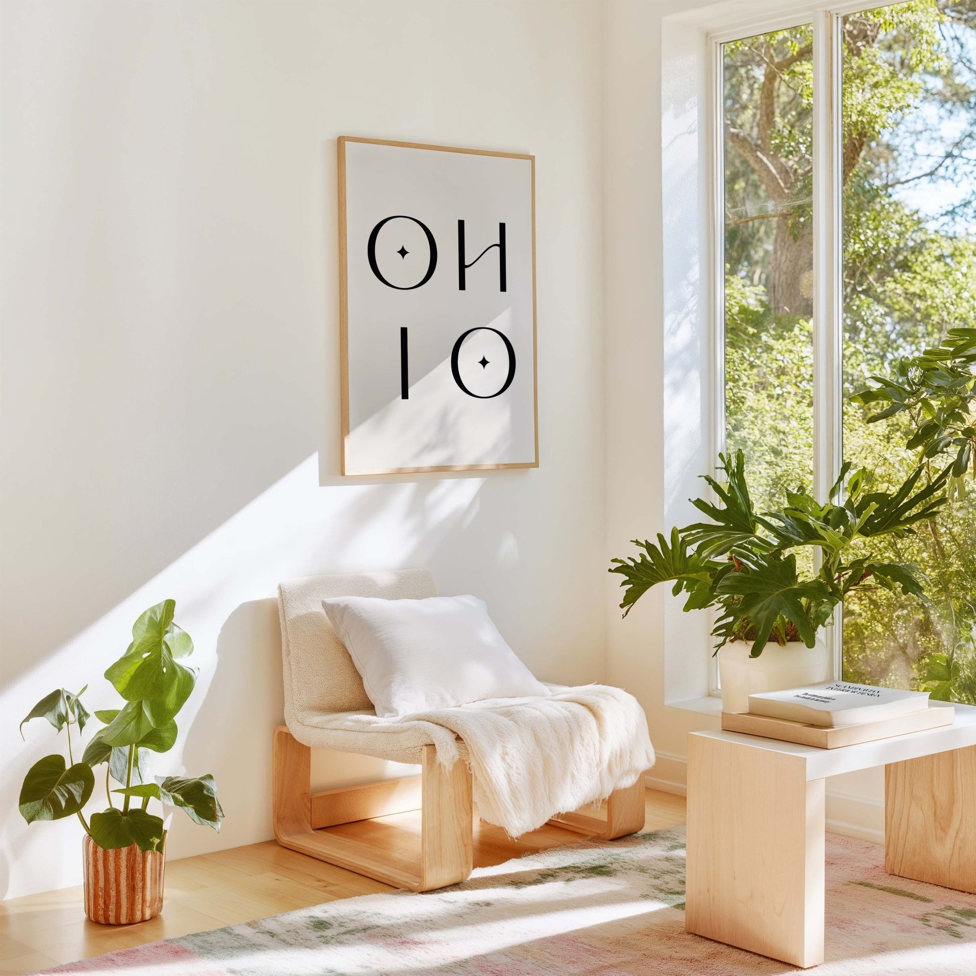 Minimalist Ohio art print styled in bright living room with plants and neutral decor