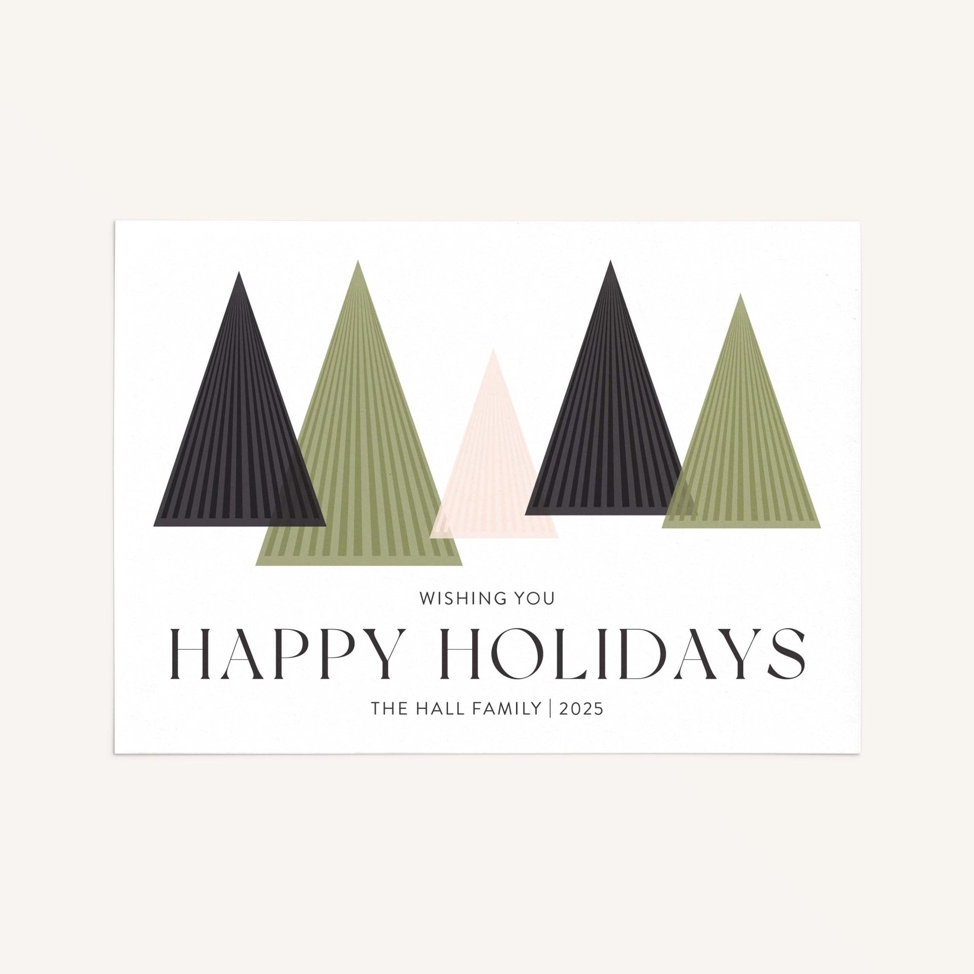 Flat lay of Modern Trees holiday card featuring geometric tree design.