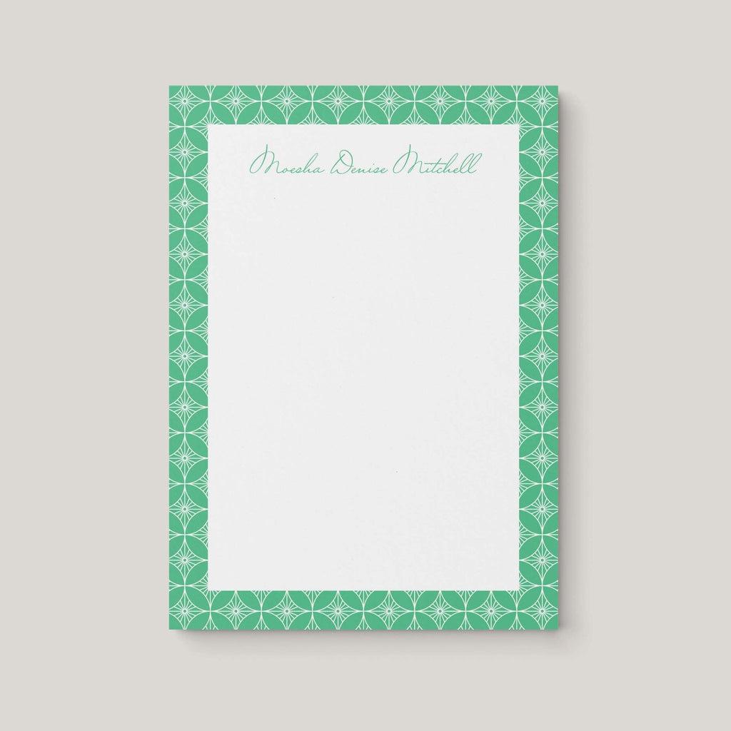 Moesha Pattern personalized notepad by Blú Rose, cream notepad with a green geometric-patterned border and the name 'Moesha Denise Mitchell' in green script