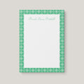 Moesha Pattern personalized notepad by Blú Rose, cream notepad with a green geometric-patterned border and the name 'Moesha Denise Mitchell' in green script