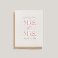 A wedding greeting card with a kraft envelope, featuring the text 'wishing you both MRS. & MRS. a happily ever after'.