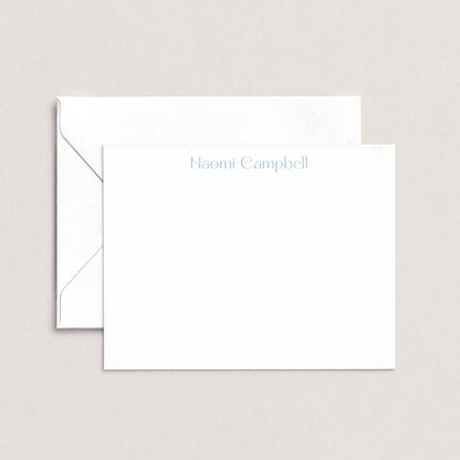 A white envelope with the name "Campbell" printed on it, placed on top of a plain white background.