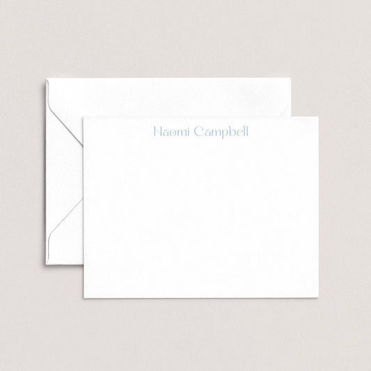 A white envelope with the name "Campbell" printed on it, placed on top of a plain white background.
