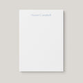 Naomi personalized notepad by Blú Rose, white notepad with the name 'Naomi Campbell' in dusty blue