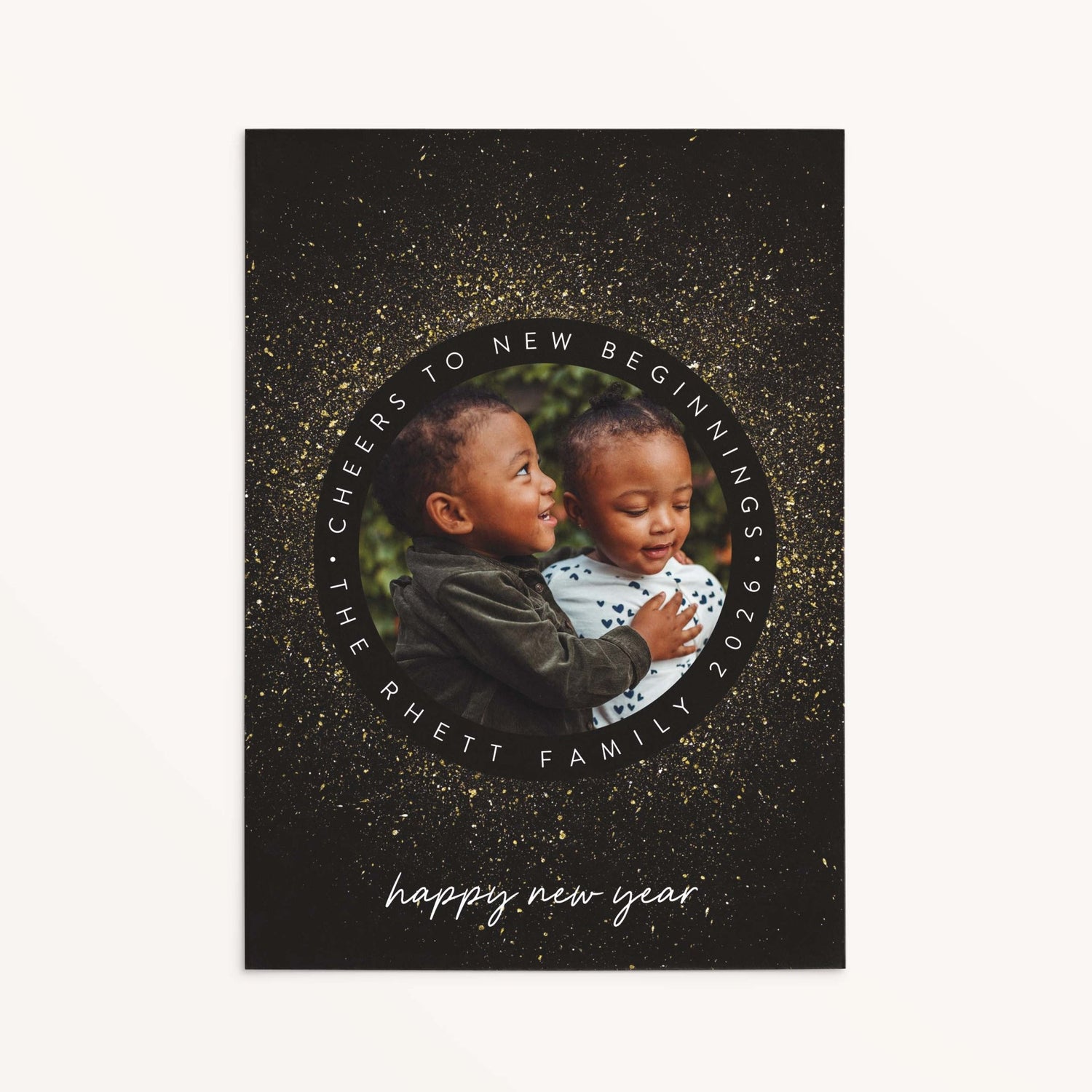 Personalized New Year Sparkle holiday photo card with circular frame, faux gold sparkle details, and black background