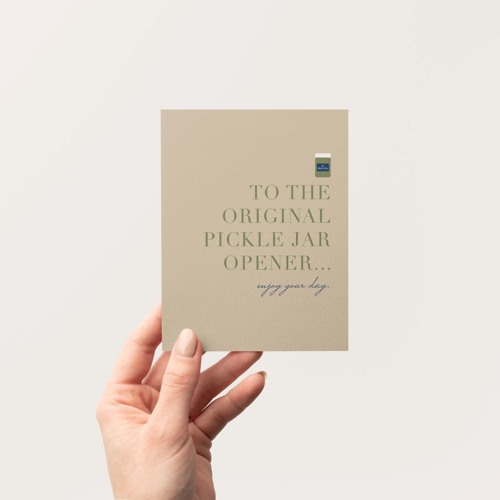 OG Pickle Jar Opener Father's Day card by Blú Rose held in hand against a neutral off-white background