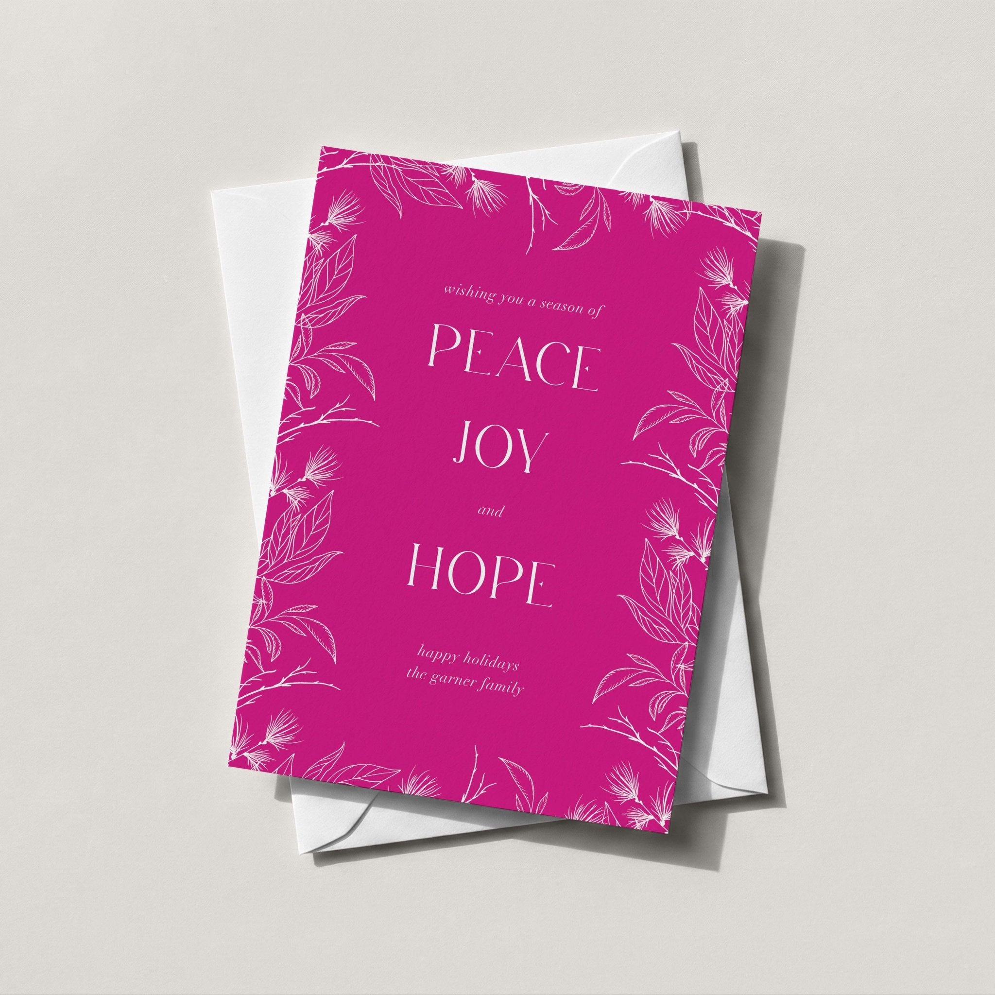 Peace Joy Hope card in bright magenta with PEACE JOY HOPE and a fine botanical line print