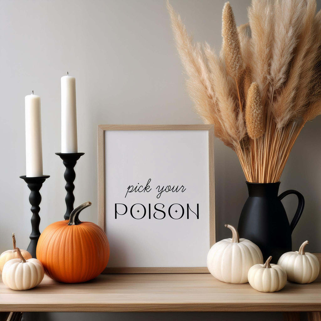 Pick Your Poison quote wall art styled with candles and fall decor on neutral shelf
