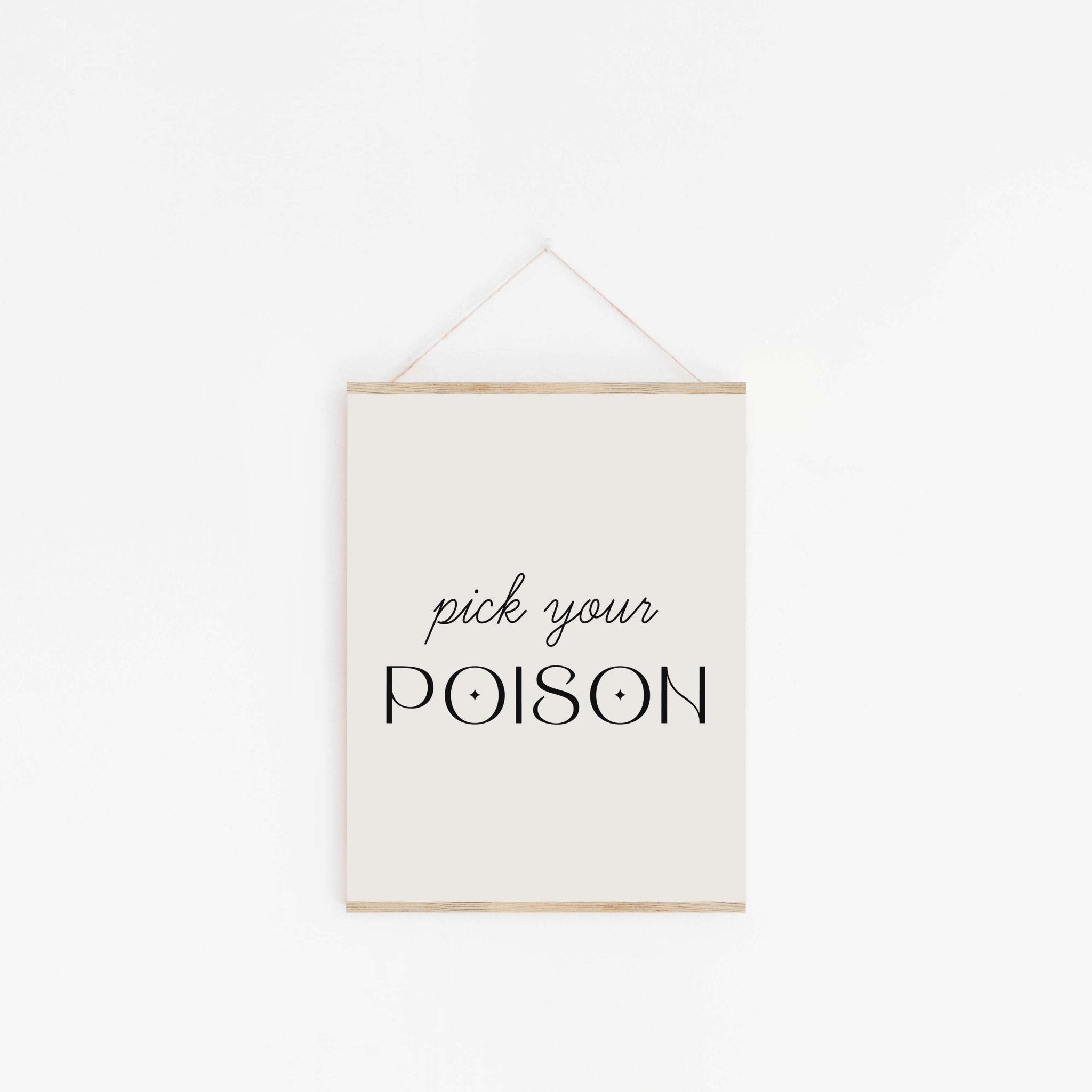 Pick Your Poison quote art print hanging from wooden hanger on off-white background