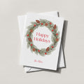 Pinecone Berry Wreath card with a red berry and pine wreath around Happy Holidays script