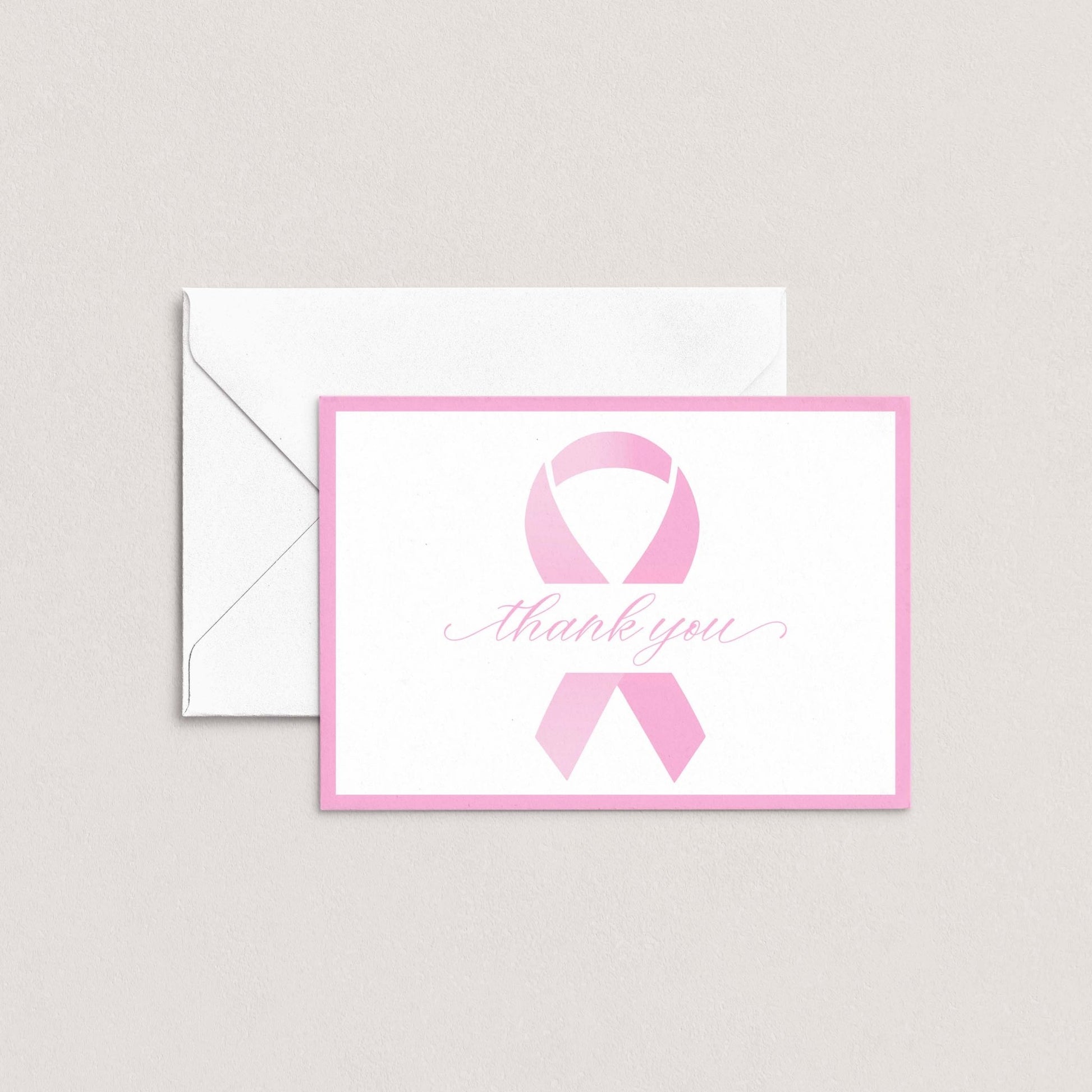 Pink Ribbon Thank You Card by Blú Rose featuring a pink awareness ribbon with script text and pink border shown flat with white envelope on a neutral background