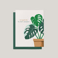 Plant Daddy Father's Day greeting card by Blú Rose, white card with monstera plant in a terracotta pot illustration, shown with green envelope