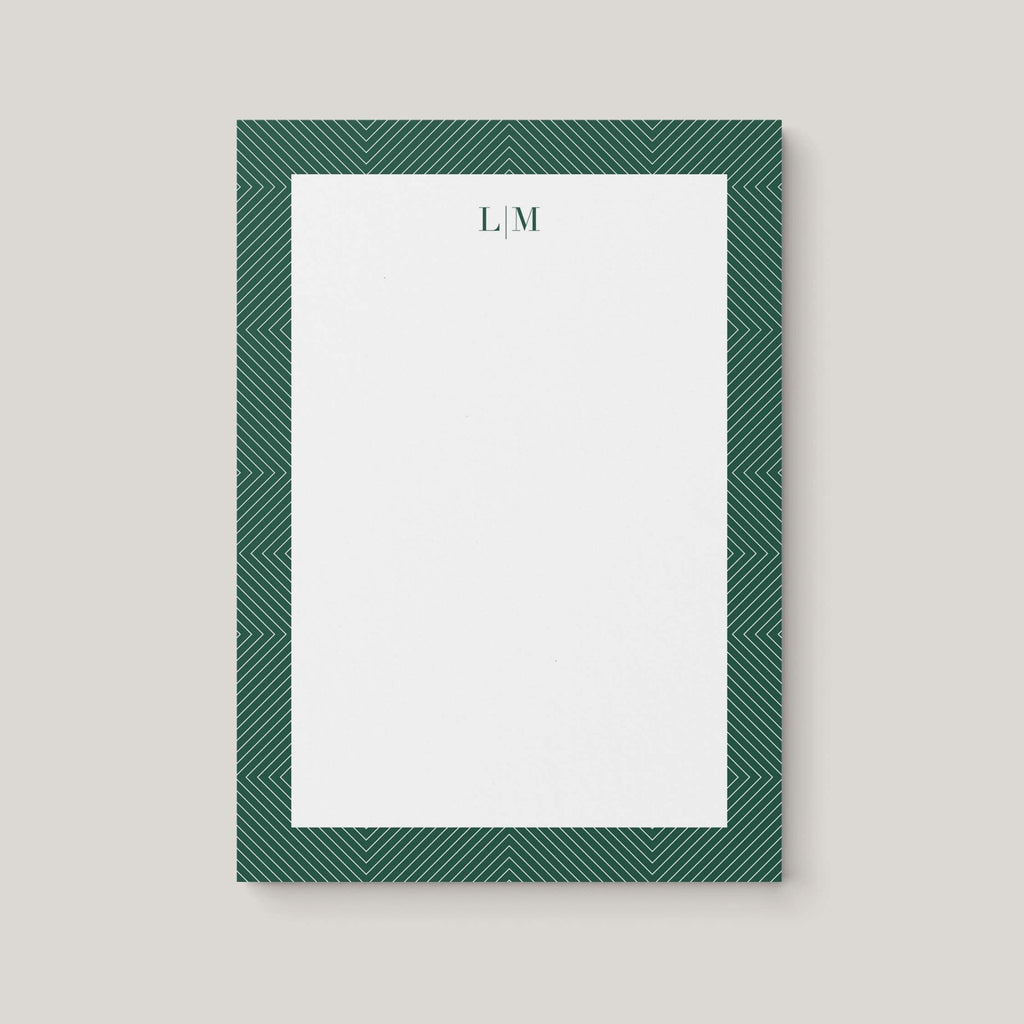Pointed Lines personalized notepad by Blú Rose, white notepad with a green geometric line border and an 'L | M' monogram in green
