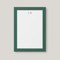 Pointed Lines personalized notepad by Blú Rose, white notepad with a green geometric line border and an 'L | M' monogram in green