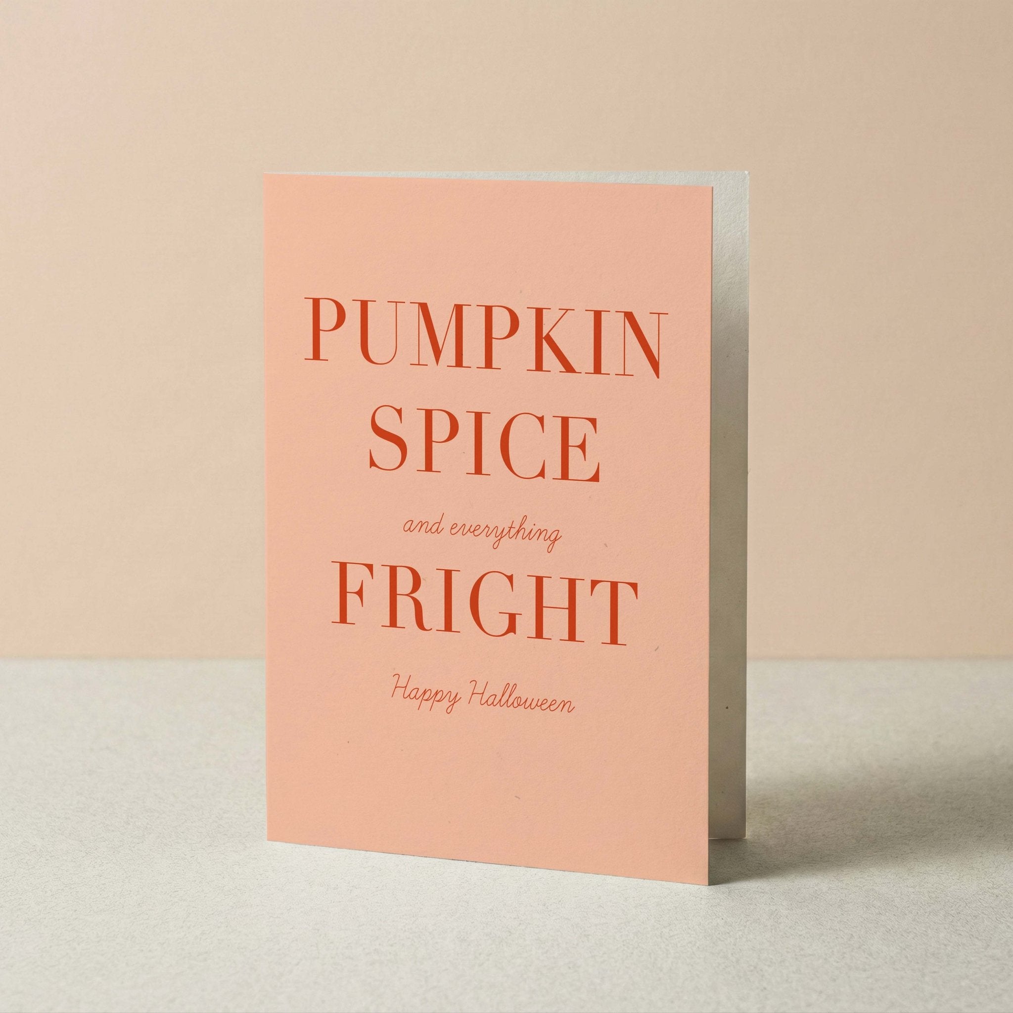 Pumpkin Spice & Everything Fright Happy Halloween card by Blú Rose standing upright, blush card with terracotta typography on a neutral background