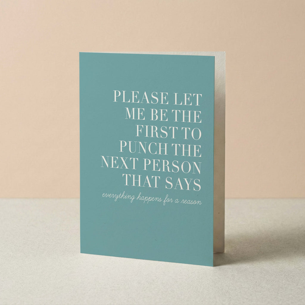 Punch the Next Person funny card by Blú Rose standing upright, dusty blue card with white typography on a neutral background