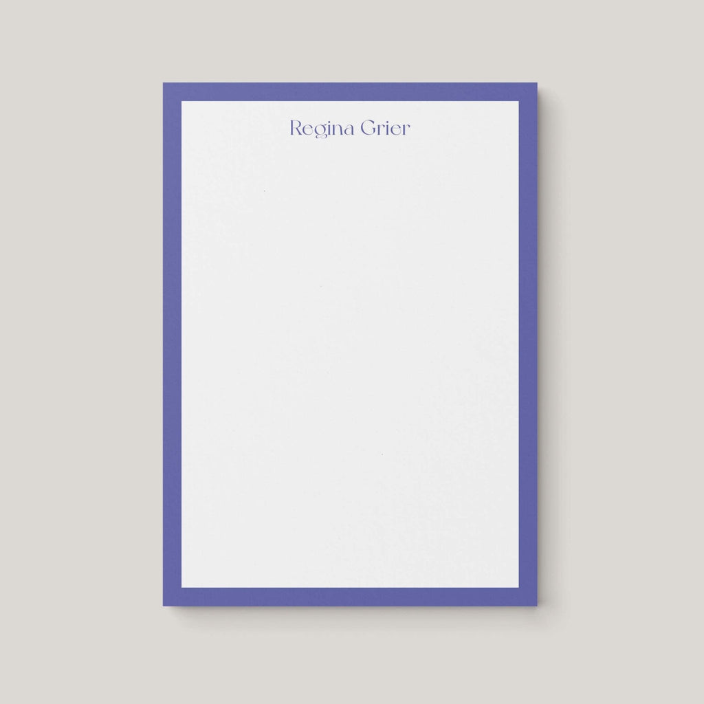 Regina Border personalized notepad by Blú Rose, white notepad with a periwinkle border and the name 'Regina Grier'