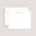 Regina personalized notecards by Blú Rose, white flat notecard with the name 'Regina Grier' in periwinkle, shown with a coordinating white envelope