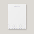 Regina Pattern personalized notepad by Blú Rose, white notepad with the name 'Regina Grier' in periwinkle and a periwinkle starburst border