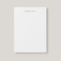 Regina personalized notepad by Blú Rose, white notepad with the name 'Regina Grier' in periwinkle