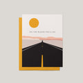 Road Trip graduation greeting card by Blú Rose, white card with open road and sun illustration and oh the places you'll go text, shown with marigold envelope