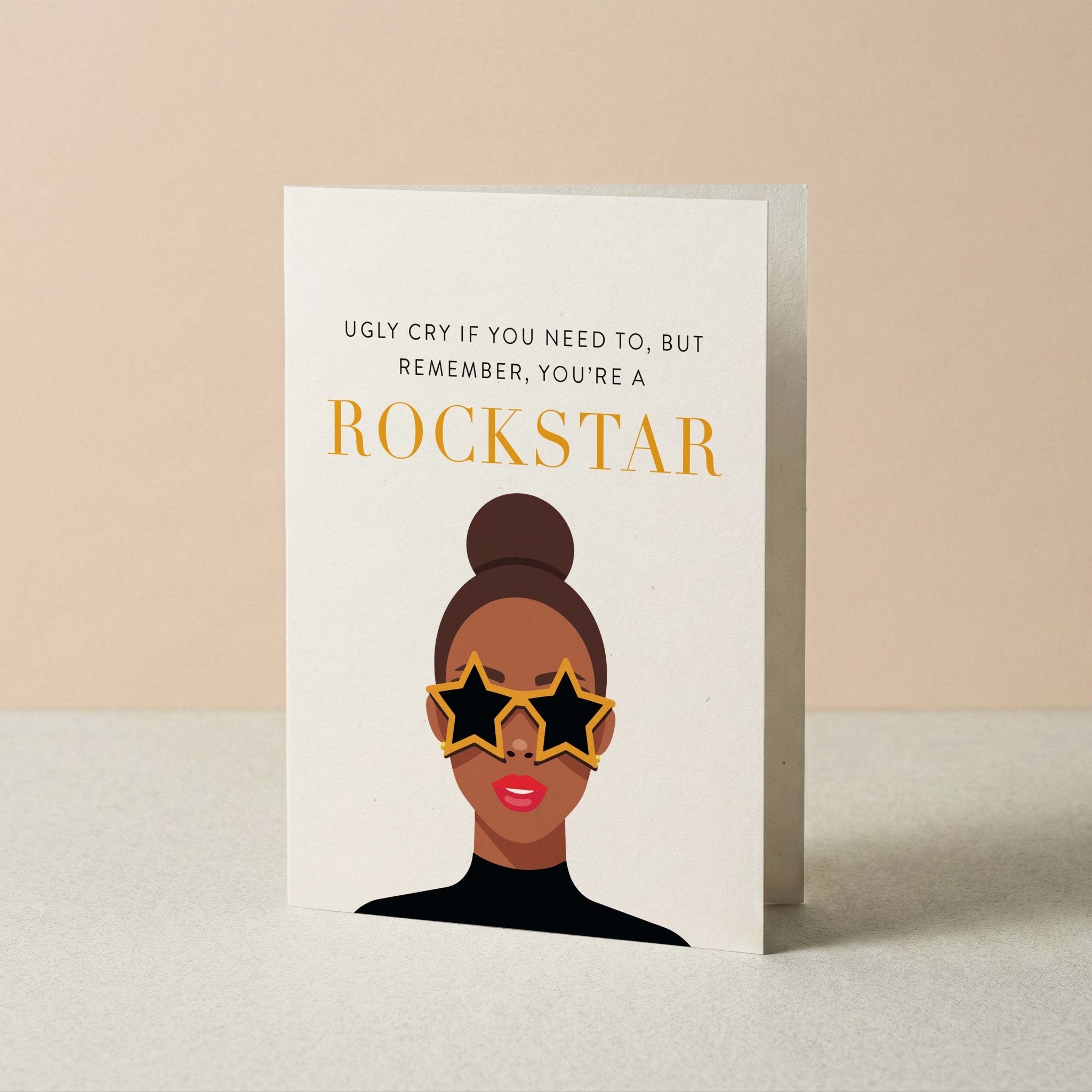 Rockstar you're a rockstar card by Blú Rose standing upright, illustrated woman in star sunglasses on a neutral background